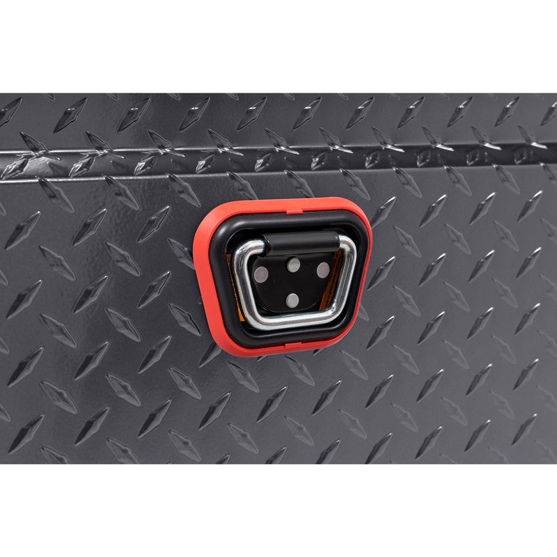 Weather Guard 123-6-04 crossover saddle box in gunmetal gray, close-up of the reinforced tie-down buckle on the body