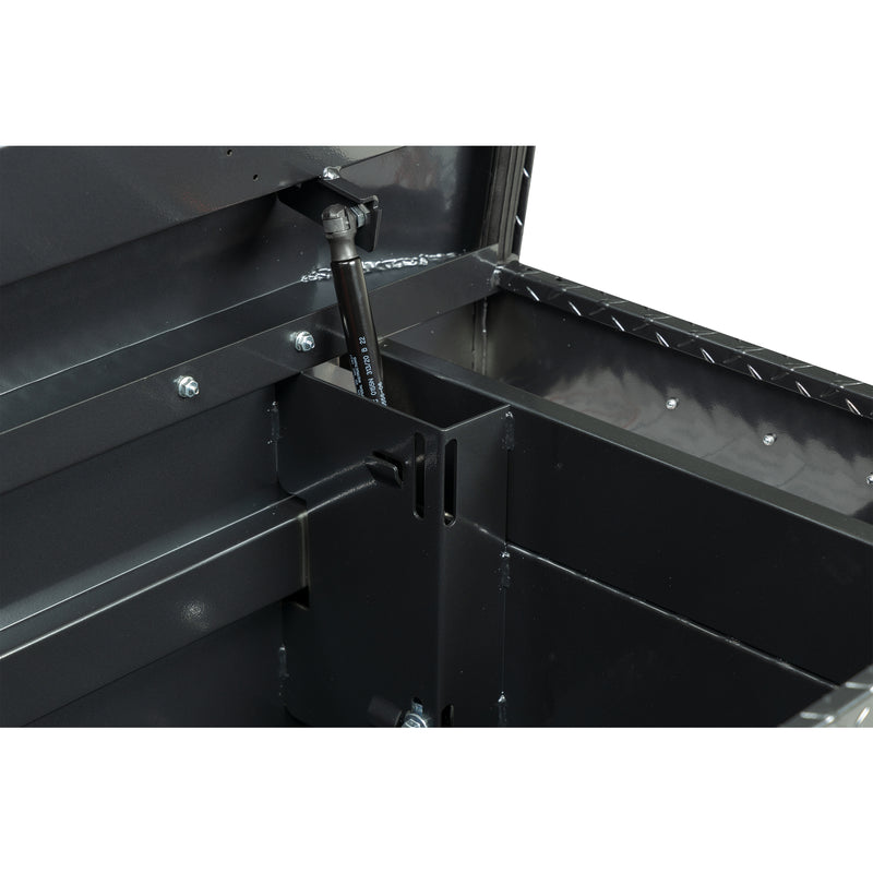 Weather Guard 123-6-04 crossover saddle box in gunmetal gray, close-up of the welded gas strut shield inside the body