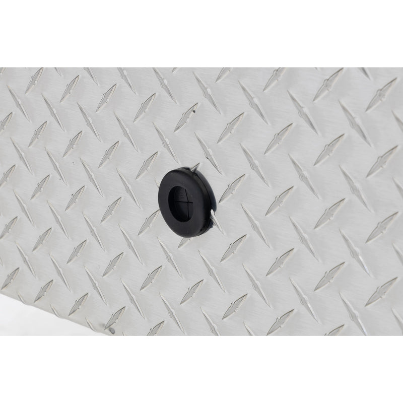 Weather Guard 124-0-04 gull-wing crossover box in bright aluminum diamond plate, close-up of the 12 volt power pass access port grommet