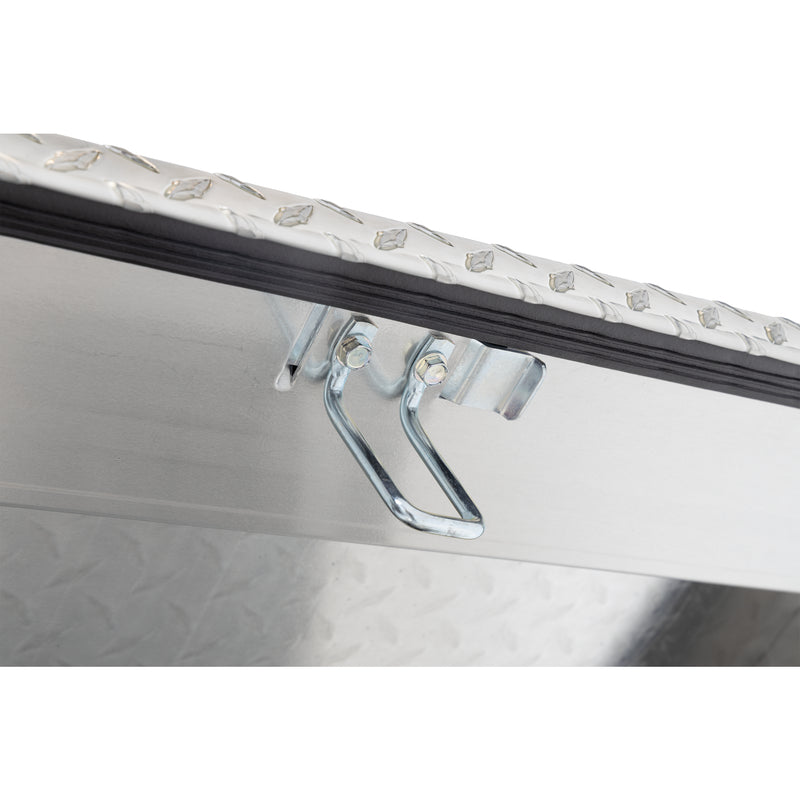 Weather Guard 124-0-04 gull-wing crossover box in bright aluminum diamond plate, close-up of the latch and striker along the lid opening