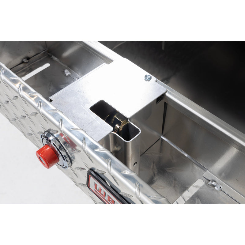 Weather Guard 124-0-04 gull-wing crossover box in bright aluminum diamond plate, close-up of the rotary latch and locking mechanism inside the body