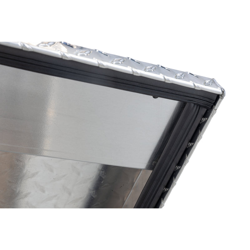 Weather Guard 124-0-04 gull-wing crossover box in bright aluminum diamond plate, close-up of the D-shaped ribbed weather seal around the opening