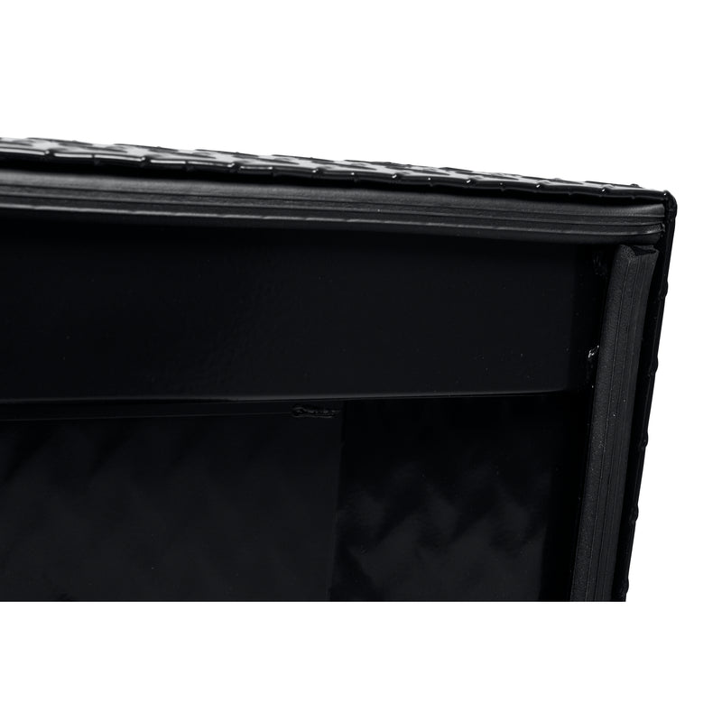 Weather Guard 127-5-04 crossover saddle box in gloss black, close-up of the D-shaped ribbed weather seal around the opening