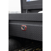 Close-up of the red-bezel 1Key UltraLock push-button lock on the matte black diamond-plate Weather Guard 127-52-04 box, installed on a truck