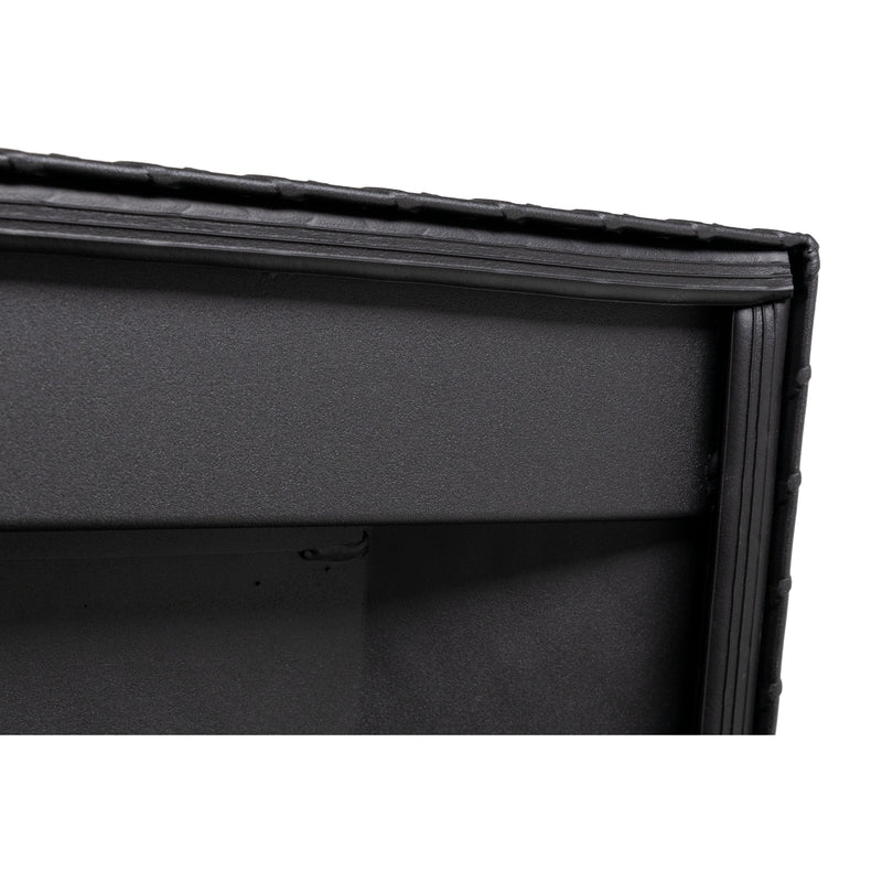 Weather Guard 127-52-04 crossover saddle box in textured matte black, close-up of the D-shaped ribbed weather seal around the opening