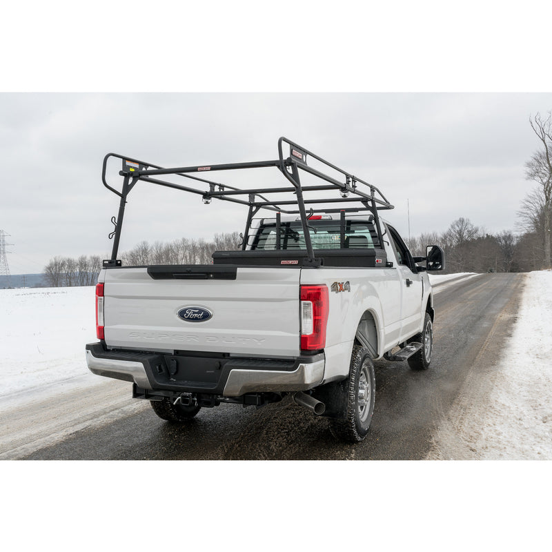 Close rear view of a white pickup with a Weather Guard truck rack and accessory cross member fitted