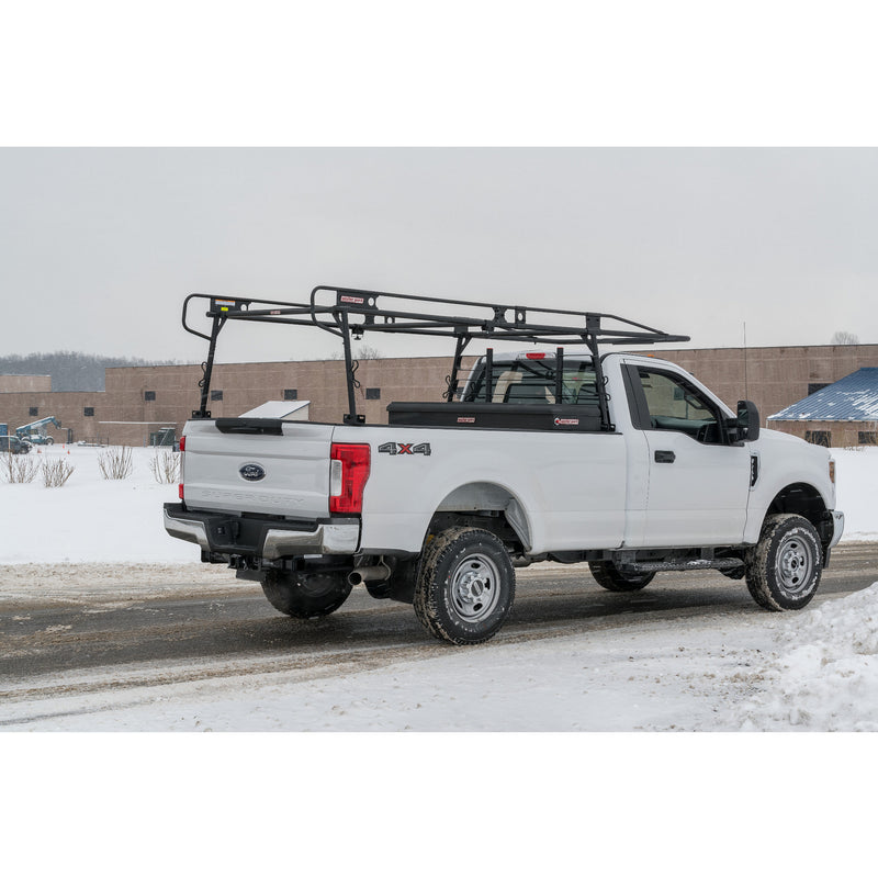 Wide right side view of a white pickup carrying a Weather Guard truck rack with an accessory cross member