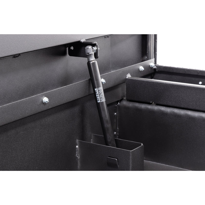 Weather Guard 131-52-04 crossover saddle box in textured matte black, close-up of the gas strut holding the lid open