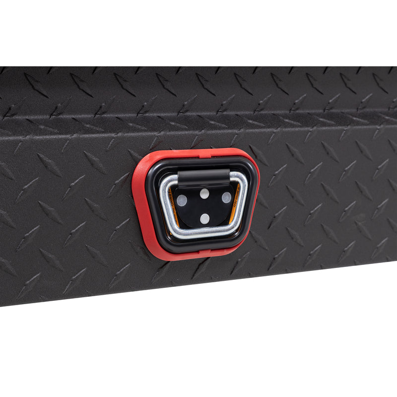 Weather Guard 131-52-04 crossover saddle box in textured matte black, close-up of the reinforced tie-down buckle on the body