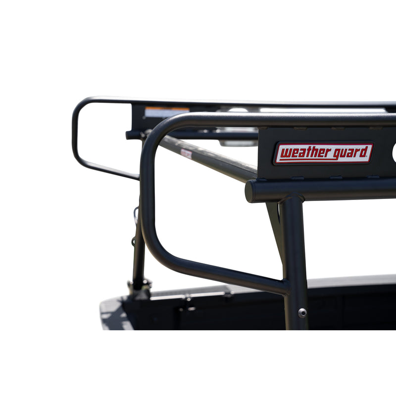 Detail of the rear frame section and weather guard badge on the compact steel truck rack
