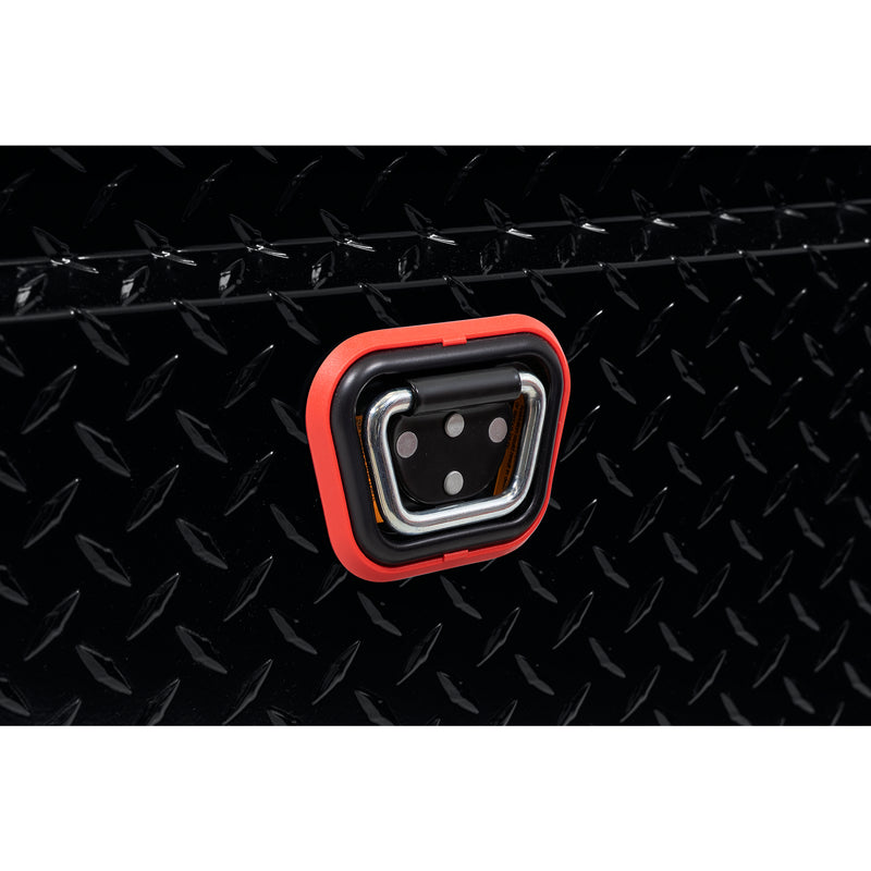 Weather Guard 137-5-04 crossover saddle box in gloss black, close-up of the reinforced tie-down buckle on the body