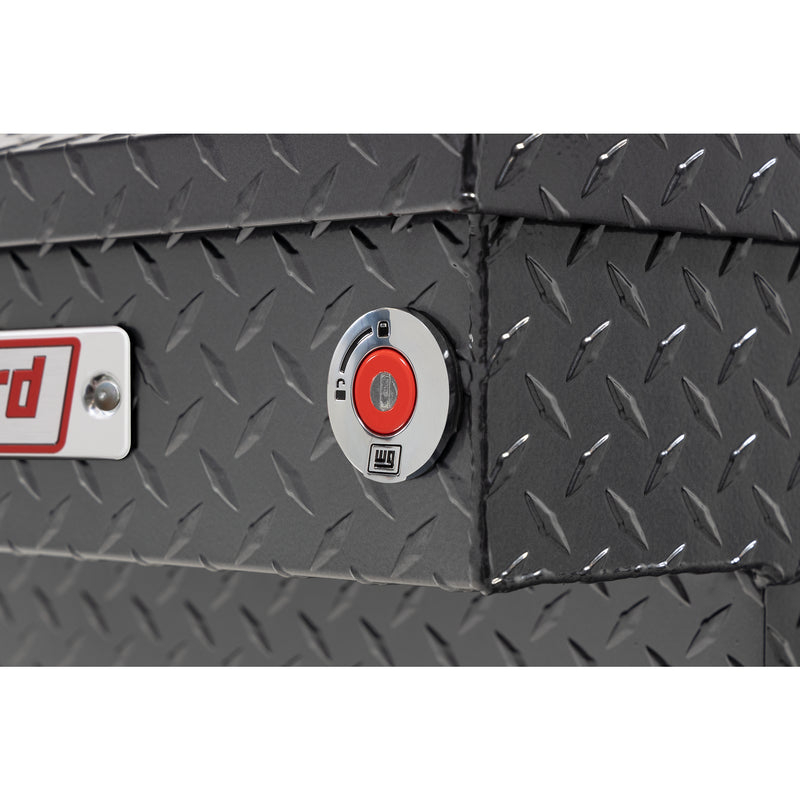 Weather Guard 137-6-04 crossover saddle box in gunmetal gray, close-up of the red push-button lock and Weather Guard badge