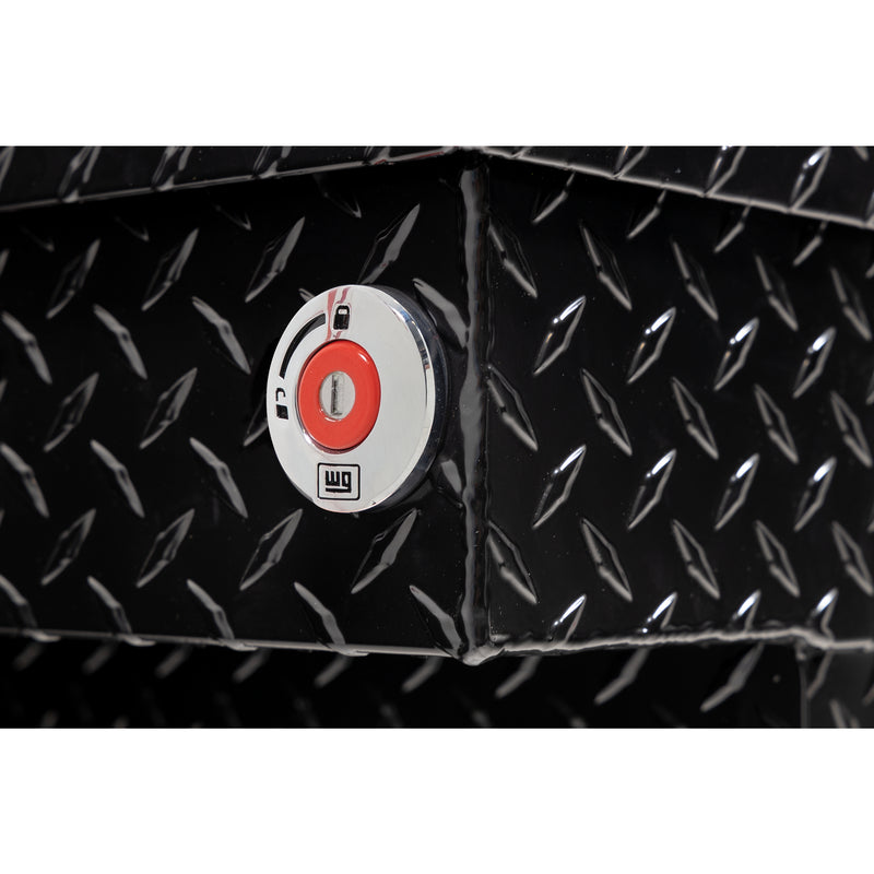 Weather Guard 154-5-04 crossover saddle box in gloss black, close-up of the red push-button lock and Weather Guard badge