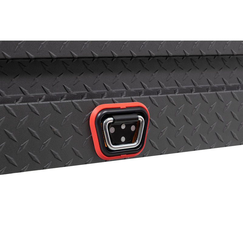 Weather Guard 154-52-04 crossover saddle box in textured matte black, close-up of the reinforced tie-down buckle on the body