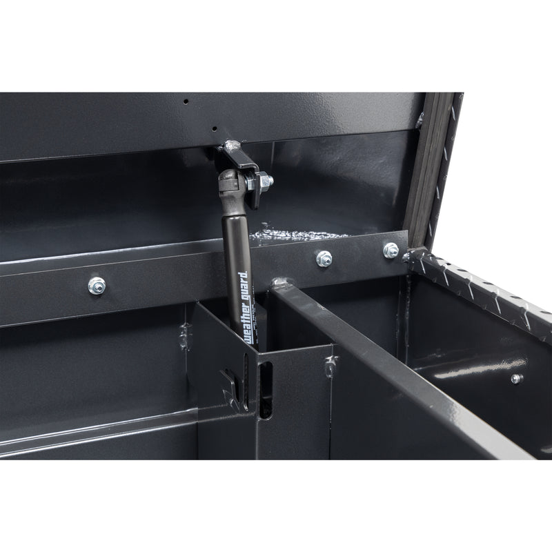 Weather Guard 154-6-04 crossover saddle box in gunmetal gray, close-up of the gas strut holding the lid open