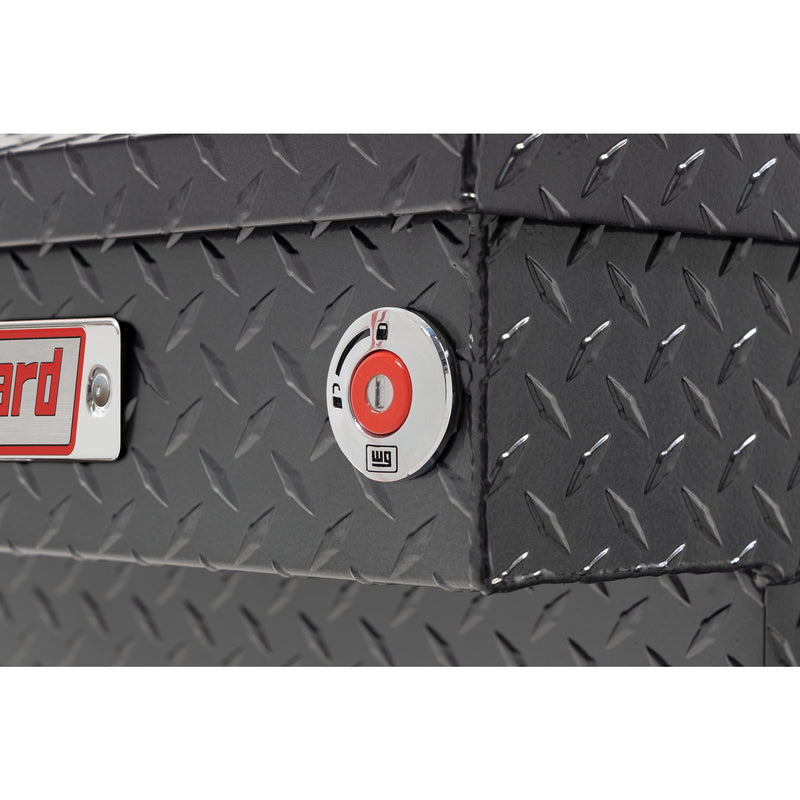 Weather Guard 154-6-04 crossover saddle box in gunmetal gray, close-up of the red push-button lock and Weather Guard badge