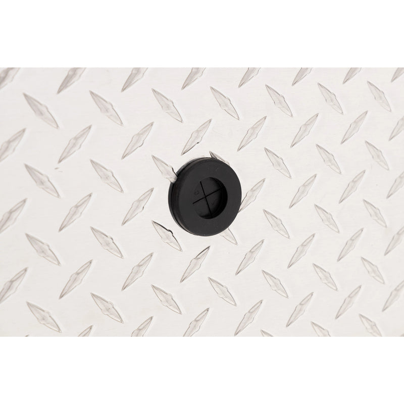 Weather Guard 164-0-04 Lo-Side box in bright aluminum diamond plate, close-up of the 12 volt power pass access port grommet