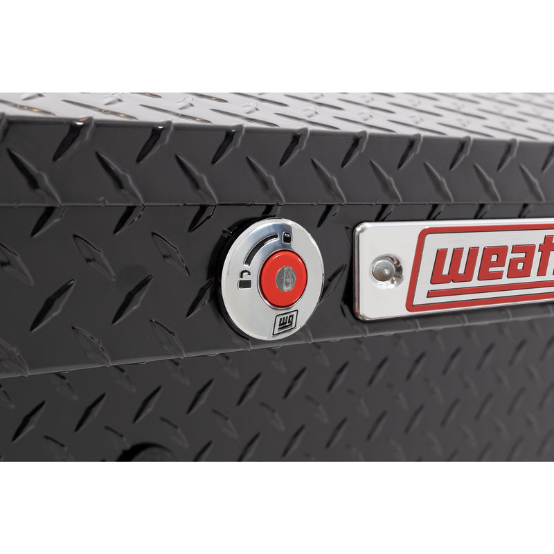 Weather Guard 164-5-04 Lo-Side box in gloss black, close-up of the red push-button lock and Weather Guard badge