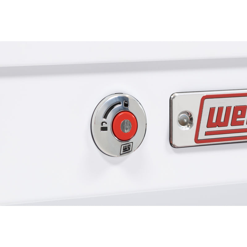 Weather Guard 165-3-04 Lo-Side box in brite white, close-up of the red push-button lock and Weather Guard badge