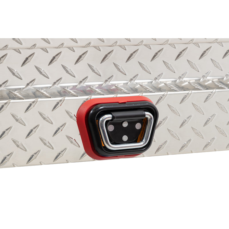 Weather Guard 174-0-04 Lo-Side box in bright aluminum diamond plate, close-up of the reinforced tie-down buckle on the body