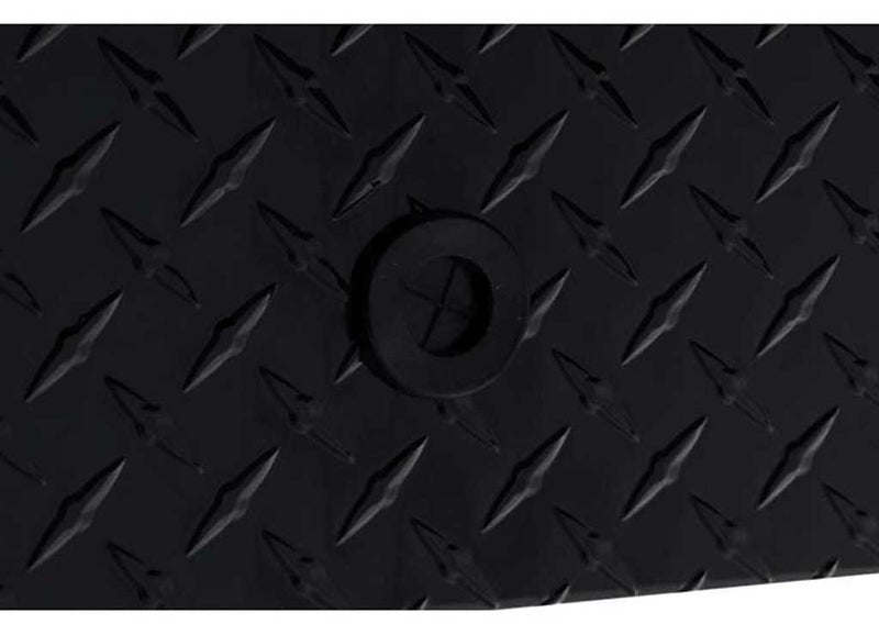Close-up of the drain plug set into the Gloss Black diamond-plate of the Weather Guard 174-5-03 box