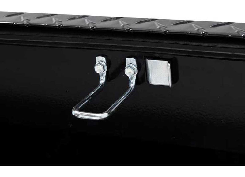 Close-up of the under-rail mounting clamp and hardware that secures the Weather Guard 174-5-03 box to the bed rail without drilling