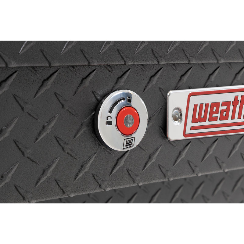 Weather Guard 174-52-04 Lo-Side box in textured matte black, close-up of the red push-button lock and Weather Guard badge