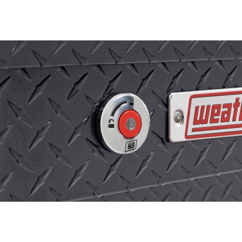 Weather Guard 174-6-04 Lo-Side box in gunmetal gray, close-up of the red push-button lock and Weather Guard badge