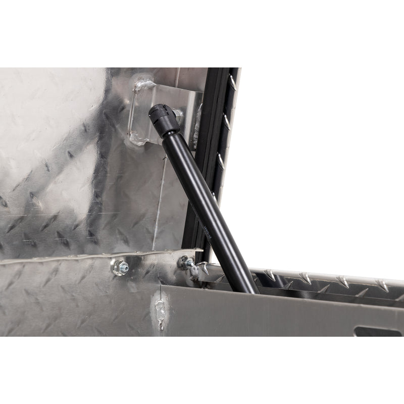 Weather Guard 180-0-04 low-profile Lo-Side box in bright aluminum diamond plate, close-up of the gas strut holding the lid open