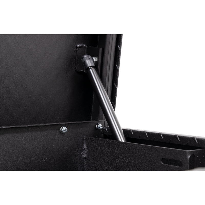 Weather Guard 180-52-04 low-profile Lo-Side box in textured matte black, close-up of the gas strut holding the lid open