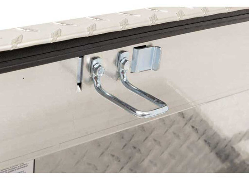 Close-up of the under-rail mounting clamp and hardware that secures the Weather Guard 184-0-03 box to the bed rail without drilling