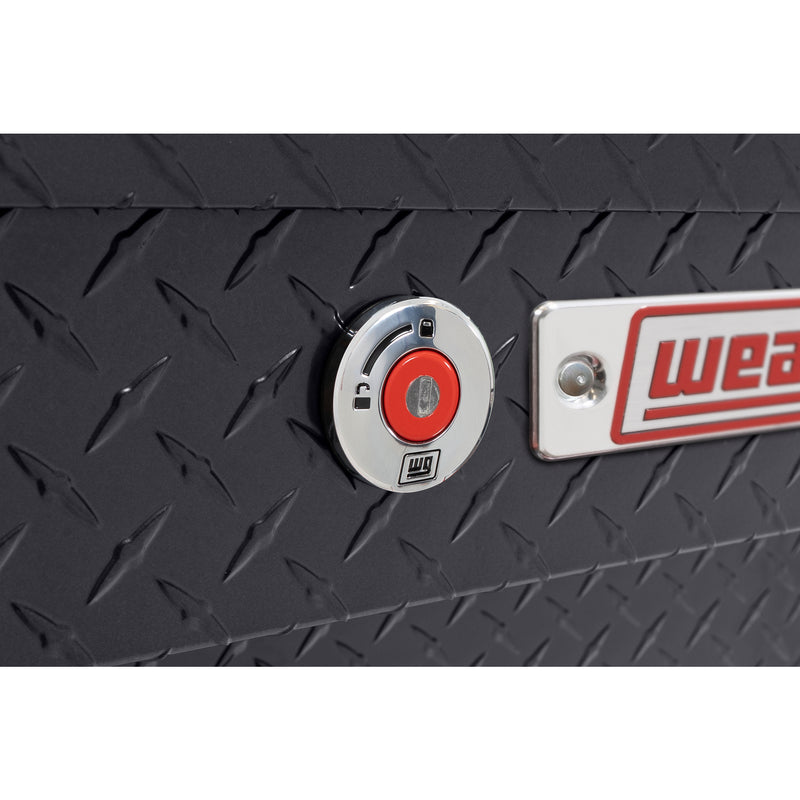 Weather Guard 184-6-04 Lo-Side box in gunmetal gray, close-up of the red push-button lock and Weather Guard badge
