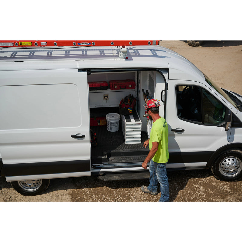Weather Guard ITEMIZER drawer units installed in the cargo area of a white Ford Transit work van with a technician alongside