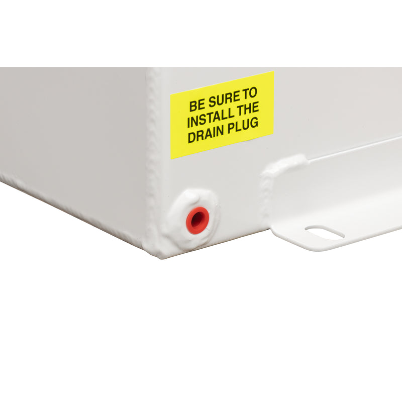 Close-up of the drain port on a brite white Weather Guard transfer tank with the install-the-drain-plug reminder label