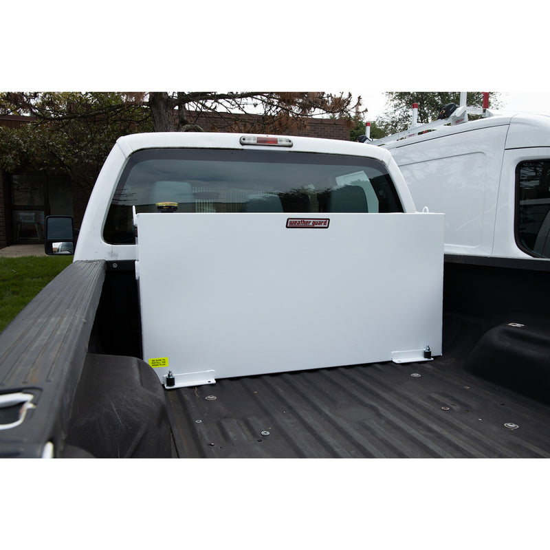 Wide view from the tailgate of the brite white 85 gallon column tank mounted in a pickup bed