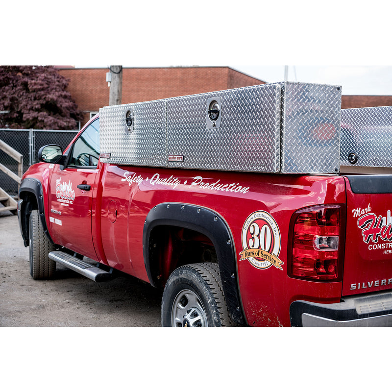 Weather Guard 396-0-02 Hi-Side box in bright aluminum diamond plate, mounted along the bed rail of a red Chevrolet Silverado work truck