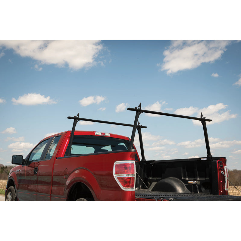 DEFENDER aluminum truck rack on a red Ford F-150 with the crossbars set wide apart
