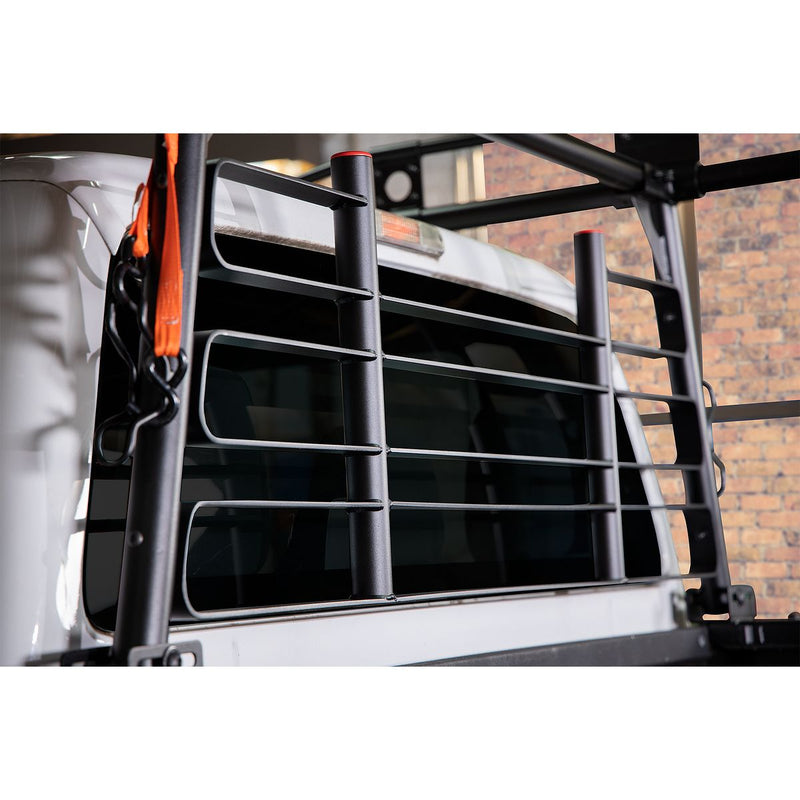 Weather Guard cab protector installed behind a pickup rear window, side view