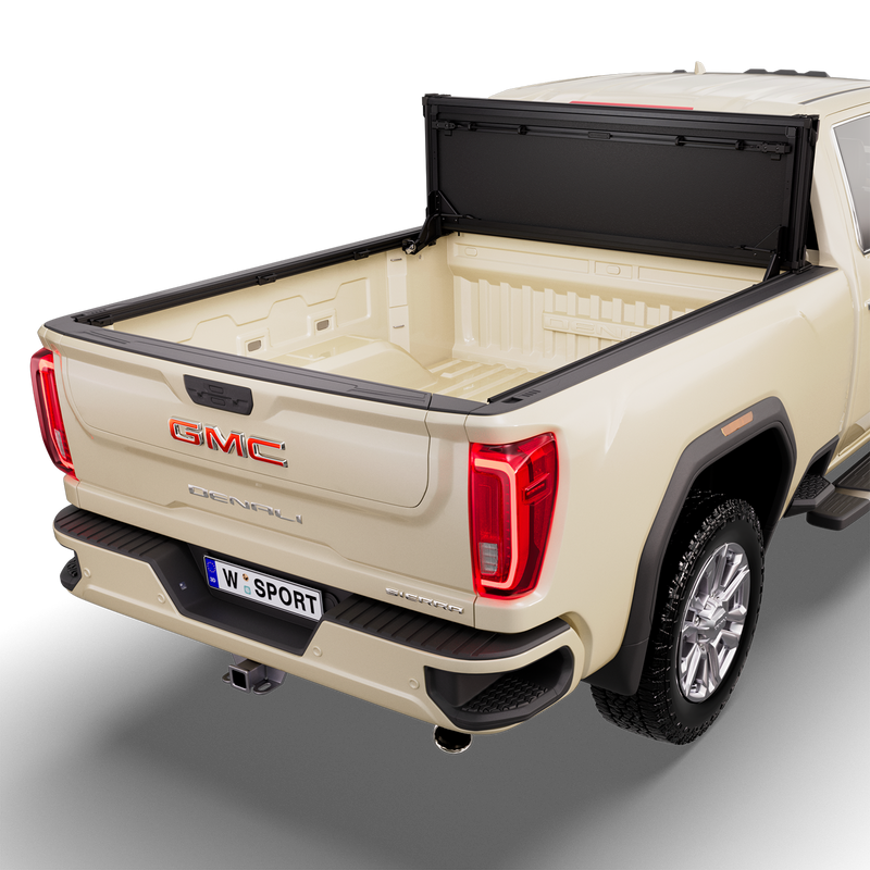 Worksport NEXUS hard folding tonneau cover on a pickup: studio render of a tan GMC Sierra Denali from the rear quarter with a black NEXUS hard folding tonneau cover with the folded cover flipped up vertical against the cab, bed fully open