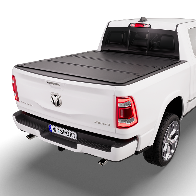 Worksport NEXUS hard folding tonneau cover shown on a 2019+ Ram 1500 without RamBox, a newer generation than the trucks this listing fits: studio render with the cover closed, all three panels flat over the bed
