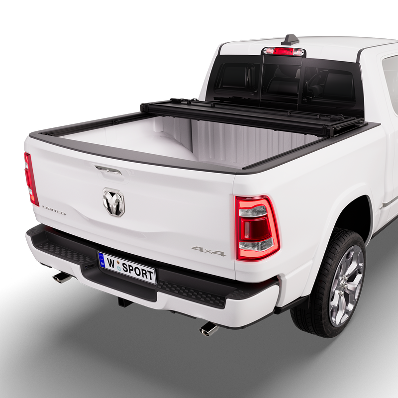 Worksport NEXUS hard folding tonneau cover shown on a 2019+ Ram 1500 without RamBox, a newer generation than the trucks this listing fits: studio render with the cover folded twice into a stack at the cab end