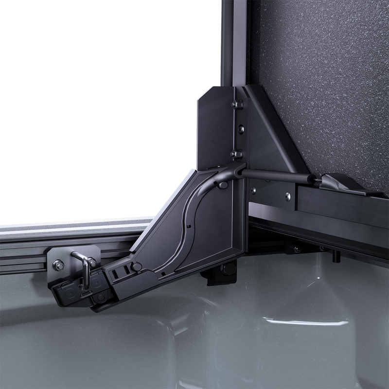 Close-up of the Worksport NEXUS hard folding tonneau cover: close-up render of the NEXUS auto-locking flip-up arm bracket clamped to the bed rail with the panel raised