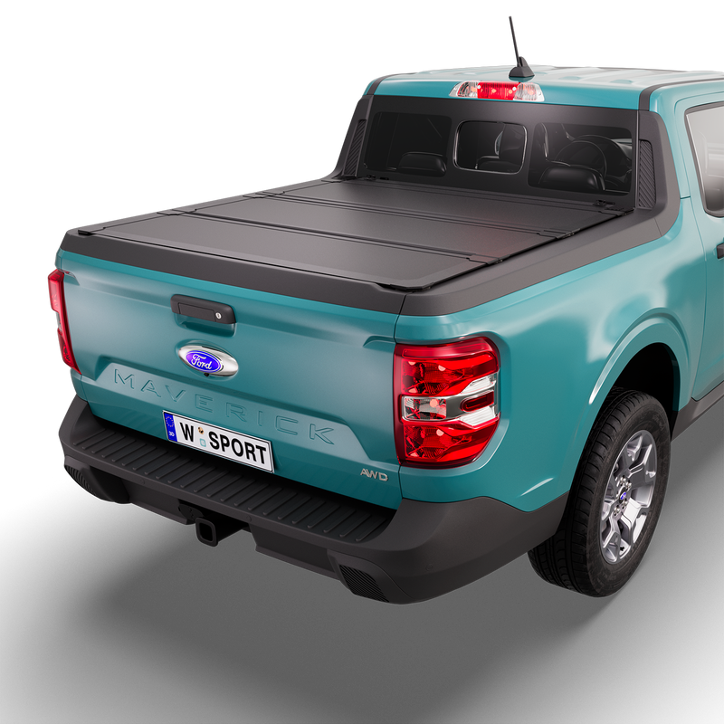 Worksport NEXUS hard folding tonneau cover on a pickup: 3D studio render of a teal Ford Maverick from the rear quarter with a black NEXUS hard folding tonneau cover closed, all three panels flat over the bed