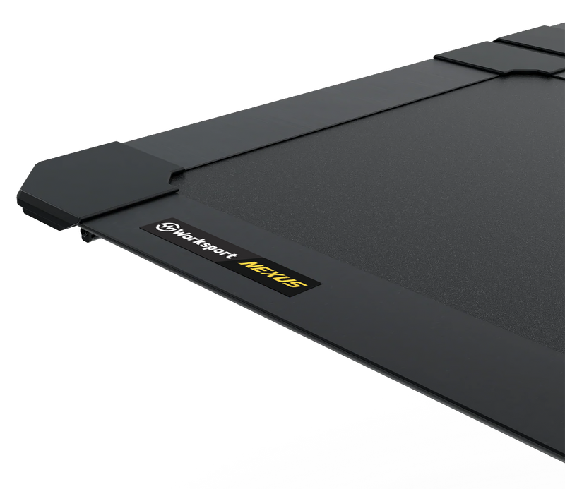 Worksport NEXUS hard folding tonneau cover illustration: studio render of the black textured cover surface and corner end cap, with a Worksport NEXUS badge on the panel