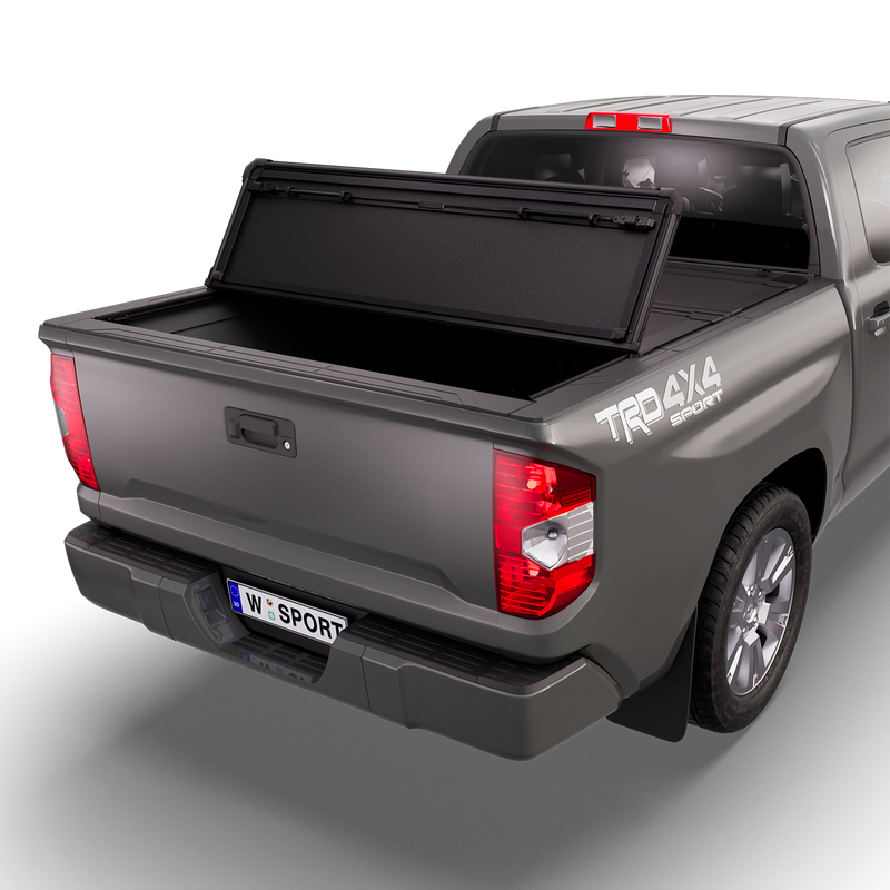 Worksport NEXUS hard folding tonneau cover shown on a 2014-21 Toyota Tundra, an older generation than the trucks this listing fits: studio render with the cover folded once, rear of the bed open