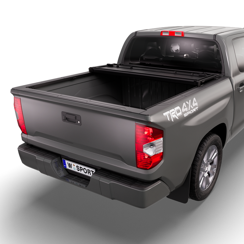 Worksport NEXUS hard folding tonneau cover shown on a 2014-21 Toyota Tundra, an older generation than the trucks this listing fits: studio render with the cover folded twice into a stack at the cab end