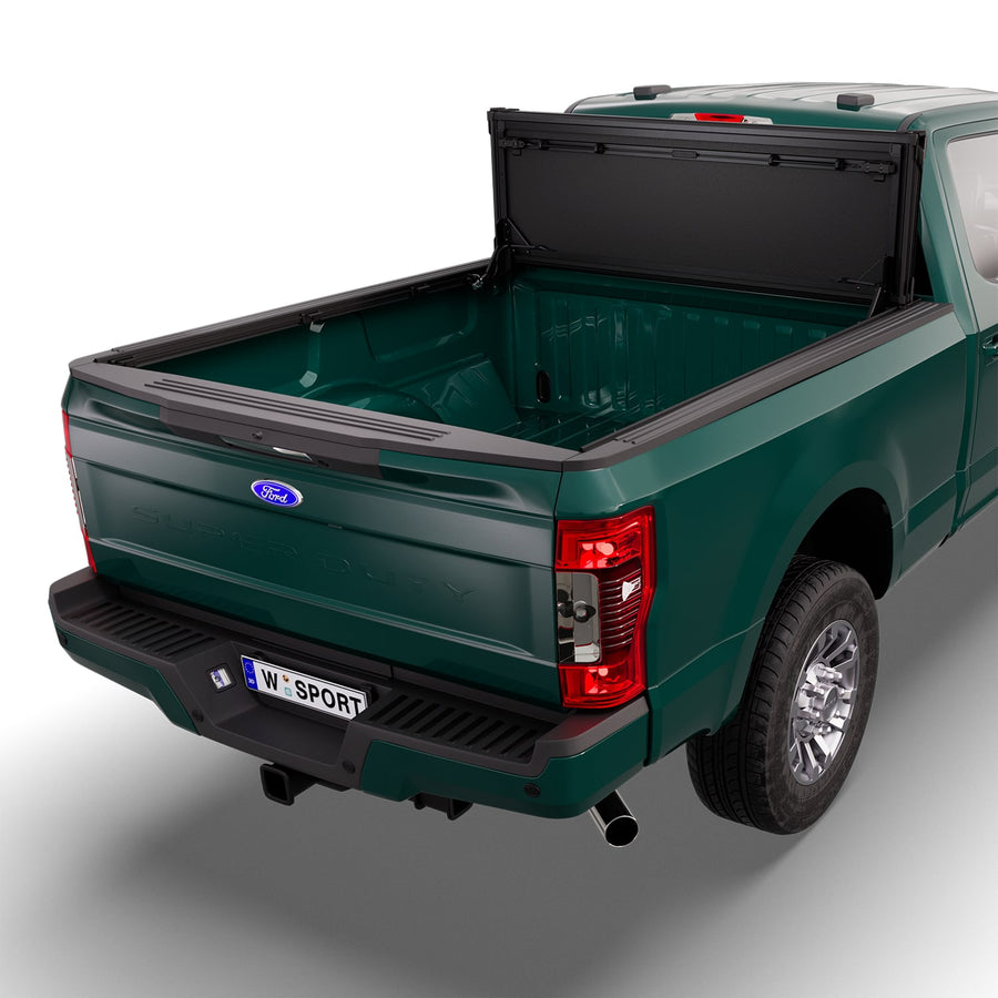 Worksport NEXUS hard folding tonneau cover folded and flipped up behind the cab, the bed open