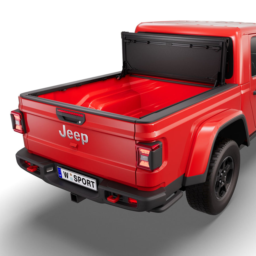 Worksport NEXUS hard folding tonneau cover folded and flipped up behind the cab, the bed open