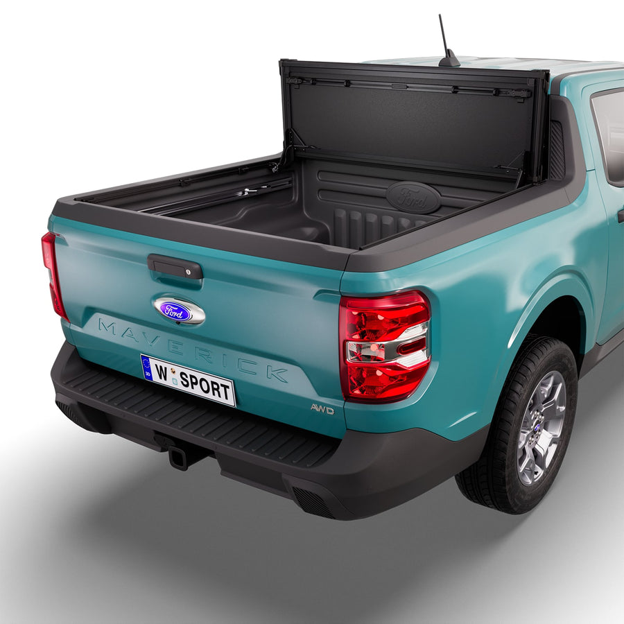 Worksport NEXUS hard folding tonneau cover folded and flipped up behind the cab, the bed open