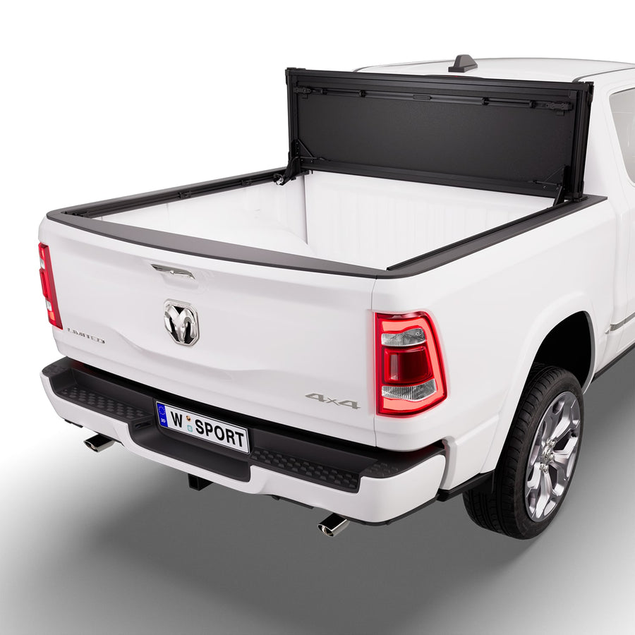 Worksport NEXUS hard folding tonneau cover folded and flipped up behind the cab, the bed open